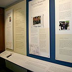 Exhibit design, panel detail with framed book presentation